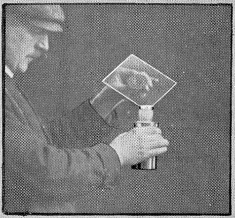Collodion pouring into bottle